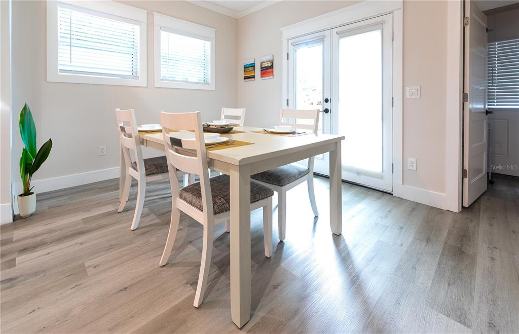 507 East Paris Street Tampa, FL 33604 - Photo 11 of 25 a view of a dining room with furniture and wooden floor
