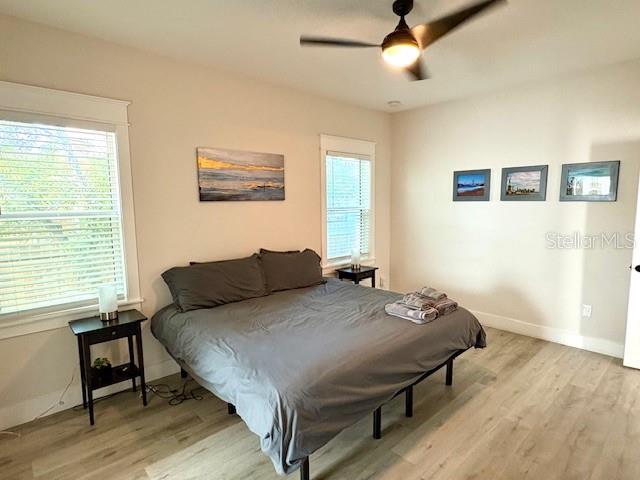 507 East Paris Street Tampa, FL 33604 - Photo 15 of 25 a bedroom with a bed and a desk