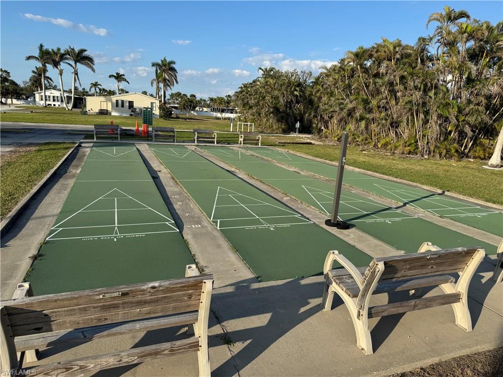 89 Sycamore Lane Fort Myers, FL 33908 - Photo 3 of 3 a view of a tennis ground with large trees