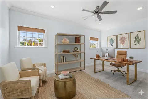 a living room with furniture and a table