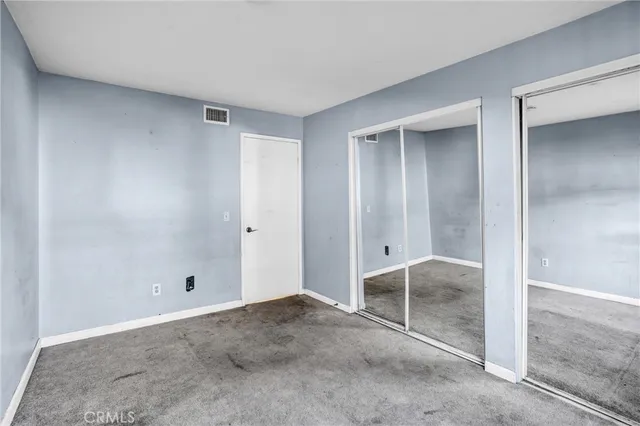 an empty room with window