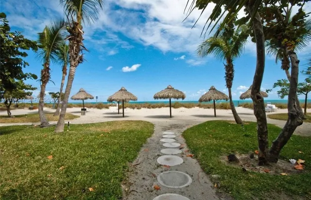 a view of a balcony with chairs