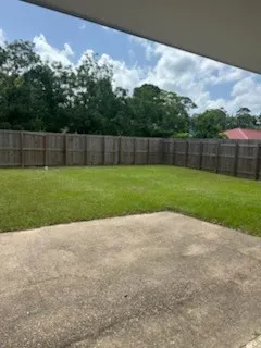 a view of a field with a yard