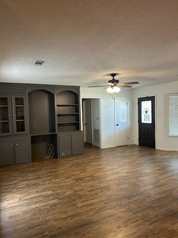 90 Live Oak Street Coldspring, TX 77331 - Photo 3 of 12 a view of a kitchen with a sink and a refrigerator