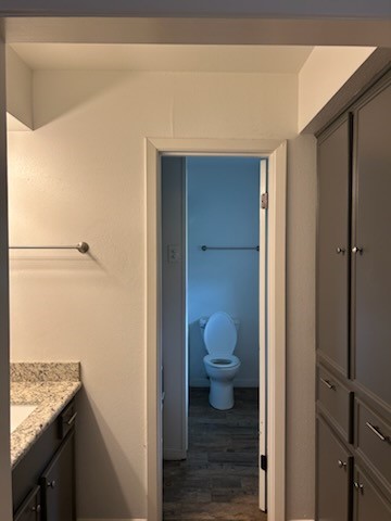 90 Live Oak Street Coldspring, TX 77331 - Photo 6 of 12 a bathroom with a toilet and a vanity