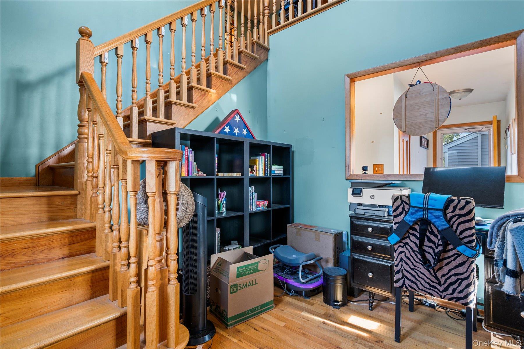 214 Pipe Stave Hollow Road Mount Sinai, NY 11766 - Photo 9 of 25 a view of a livingroom with furniture and workspace