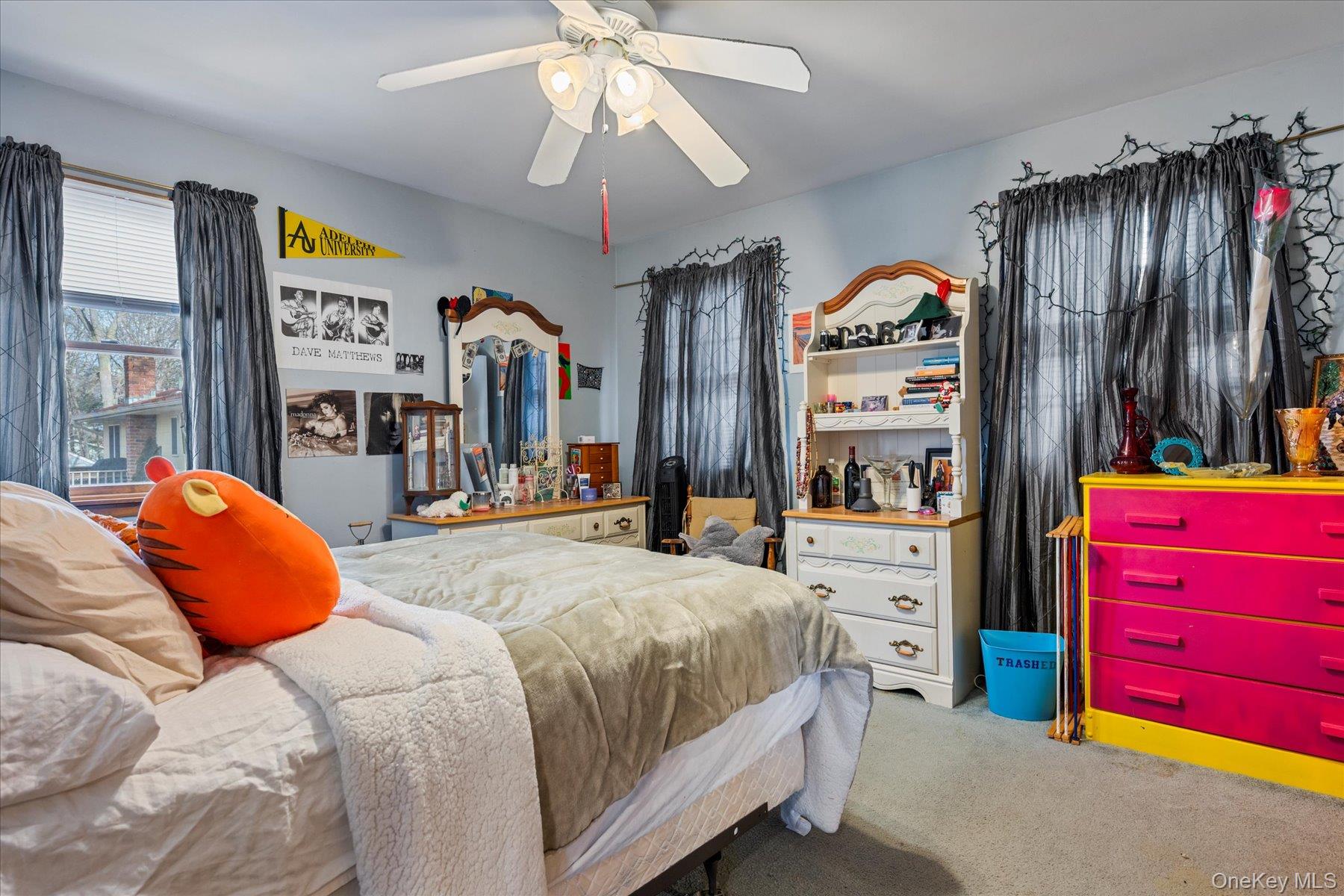 214 Pipe Stave Hollow Road Mount Sinai, NY 11766 - Photo 11 of 25 a bedroom with a bed and a closet