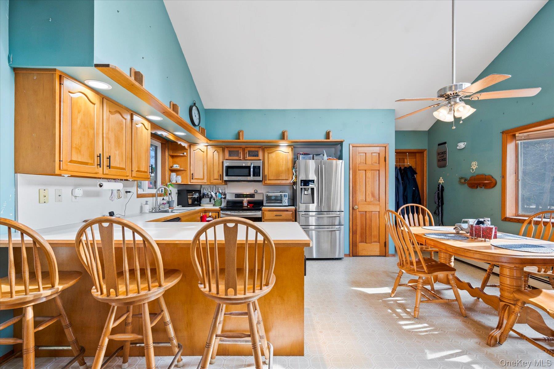 214 Pipe Stave Hollow Road Mount Sinai, NY 11766 - Photo 4 of 25 a dinning area with pool table and chairs