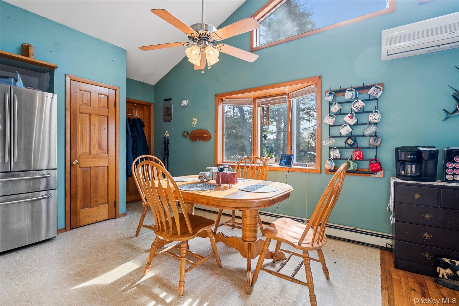 214 Pipe Stave Hollow Road Mount Sinai, NY 11766 - Photo 6 of 25 a dining room with furniture and window