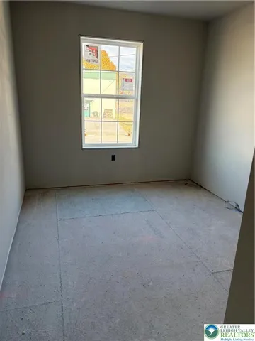 an empty room with a window