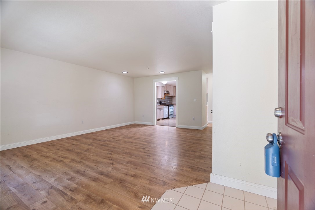 18135 Tamara Lane Southwest Rochester, WA 98579 - Photo 5 of 20 a view of a livingroom with wooden floor