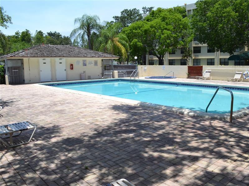 2401 Riverside Drive, Unit 308 Coral Springs, FL 33065 - Photo 15 of 15 a view of a yard