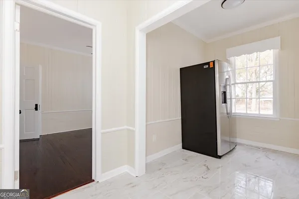 a kitchen with granite countertop a sink and a stove