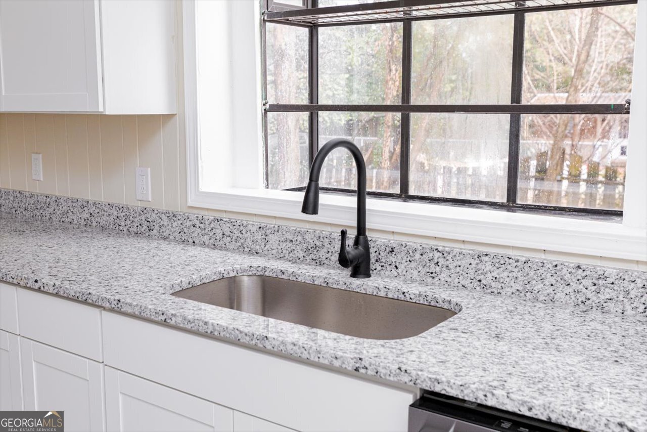 1205 Swift Street Perry, GA 31069 - Photo 27 of 63 a close view of sink and tap