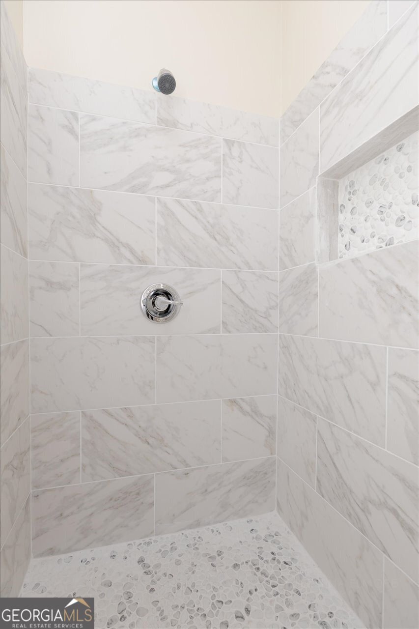 1205 Swift Street Perry, GA 31069 - Photo 37 of 63 a bathroom with a shower