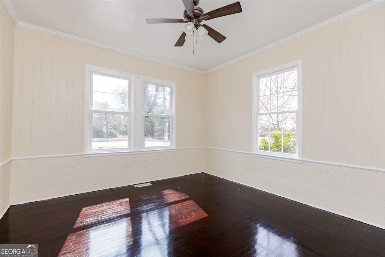 1205 Swift Street Perry, GA 31069 - Photo 45 of 63 a view of a room with wooden floor and windows
