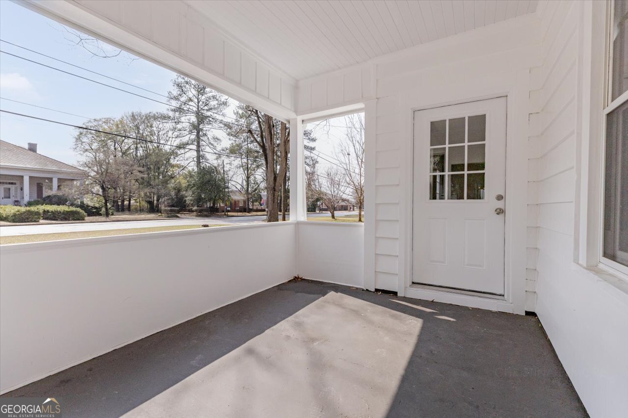 1205 Swift Street Perry, GA 31069 - Photo 7 of 63 a view of an empty room with a window