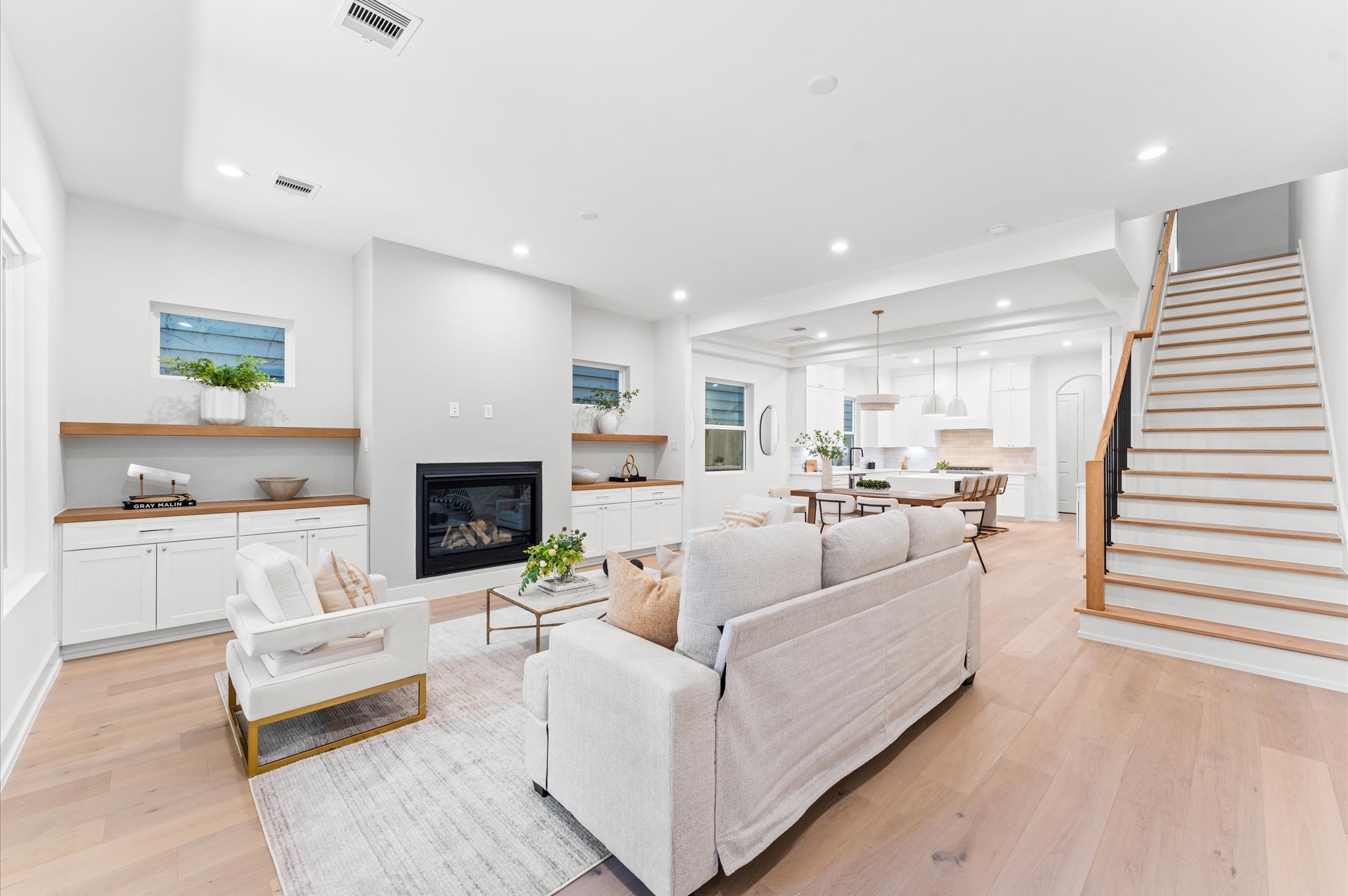 4403 Feagan Street Houston, TX 77007 - Photo 14 of 40 a living room with furniture and a fireplace