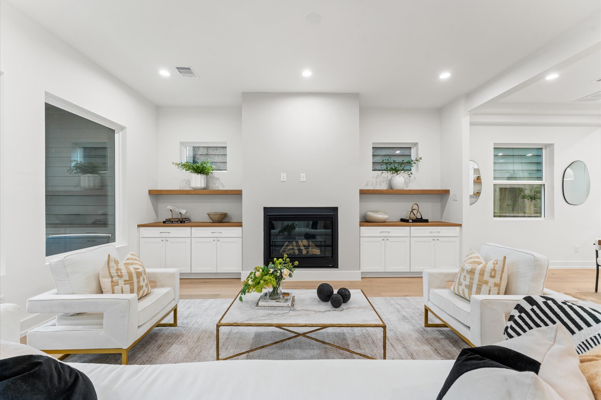 4403 Feagan Street Houston, TX 77007 - Photo 16 of 40 a living room with furniture and a fireplace