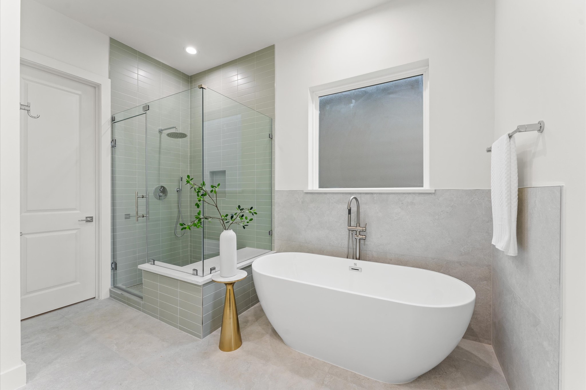 4403 Feagan Street Houston, TX 77007 - Photo 29 of 40 a white bath tub sitting next to a white sink and vanity