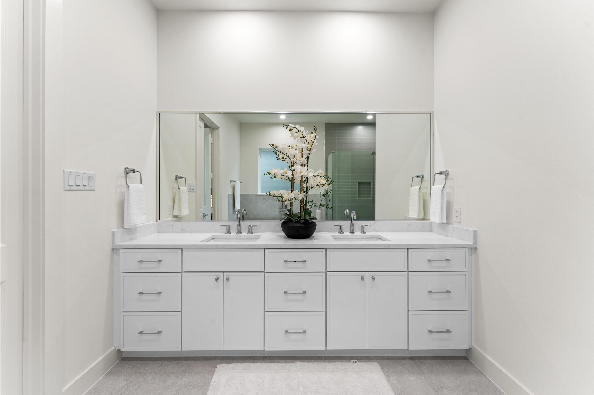4403 Feagan Street Houston, TX 77007 - Photo 30 of 40 a bathroom with a double vanity sink and a mirror