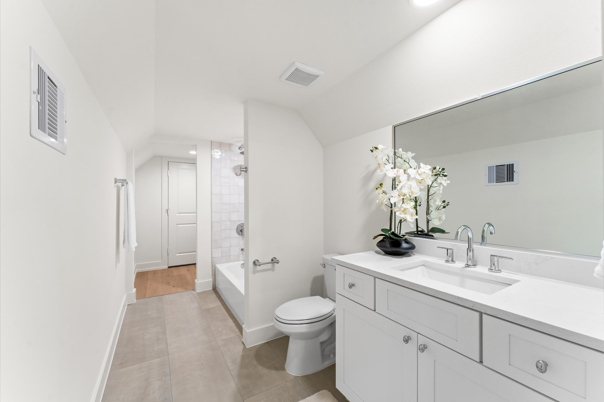 4403 Feagan Street Houston, TX 77007 - Photo 36 of 40 a bathroom with a sink a toilet and shower