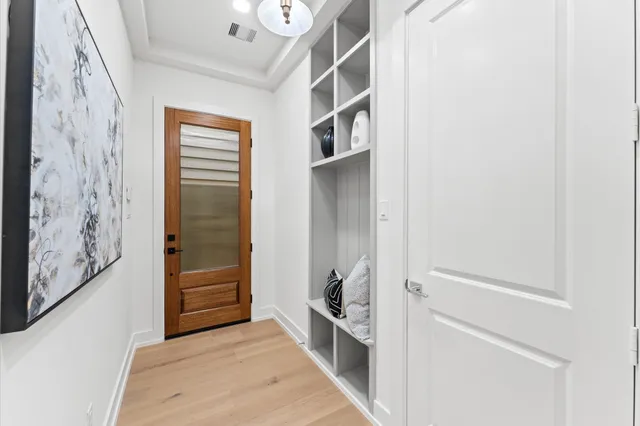 a large kitchen with kitchen island a sink a stove a dining table and chairs