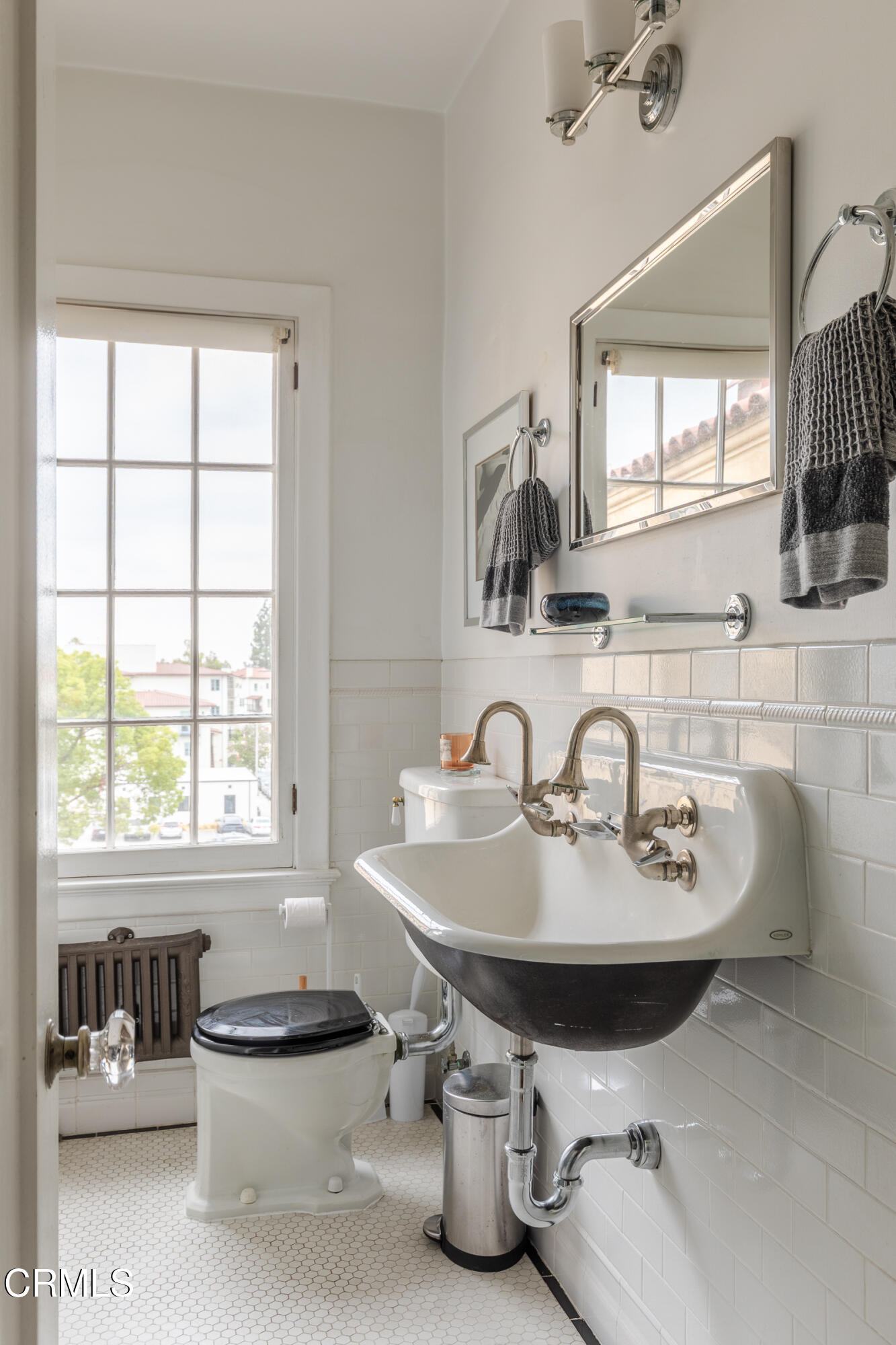 85 North Madison Avenue, Unit 48 Pasadena, CA 91101 - Photo 13 of 31 a bathroom with a sink double vanity and a window