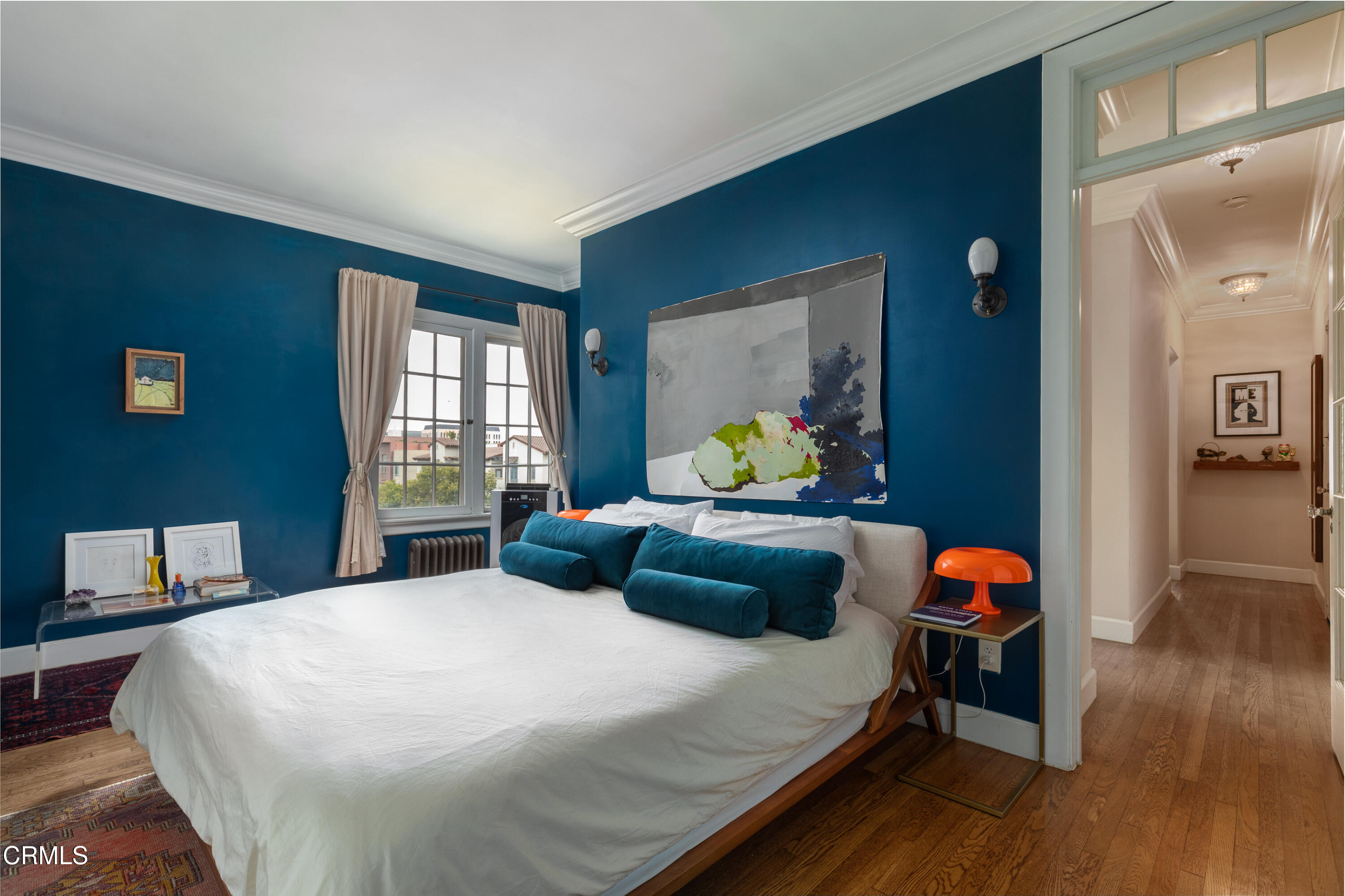 85 North Madison Avenue, Unit 48 Pasadena, CA 91101 - Photo 20 of 31 a bedroom with a bed and wooden floor