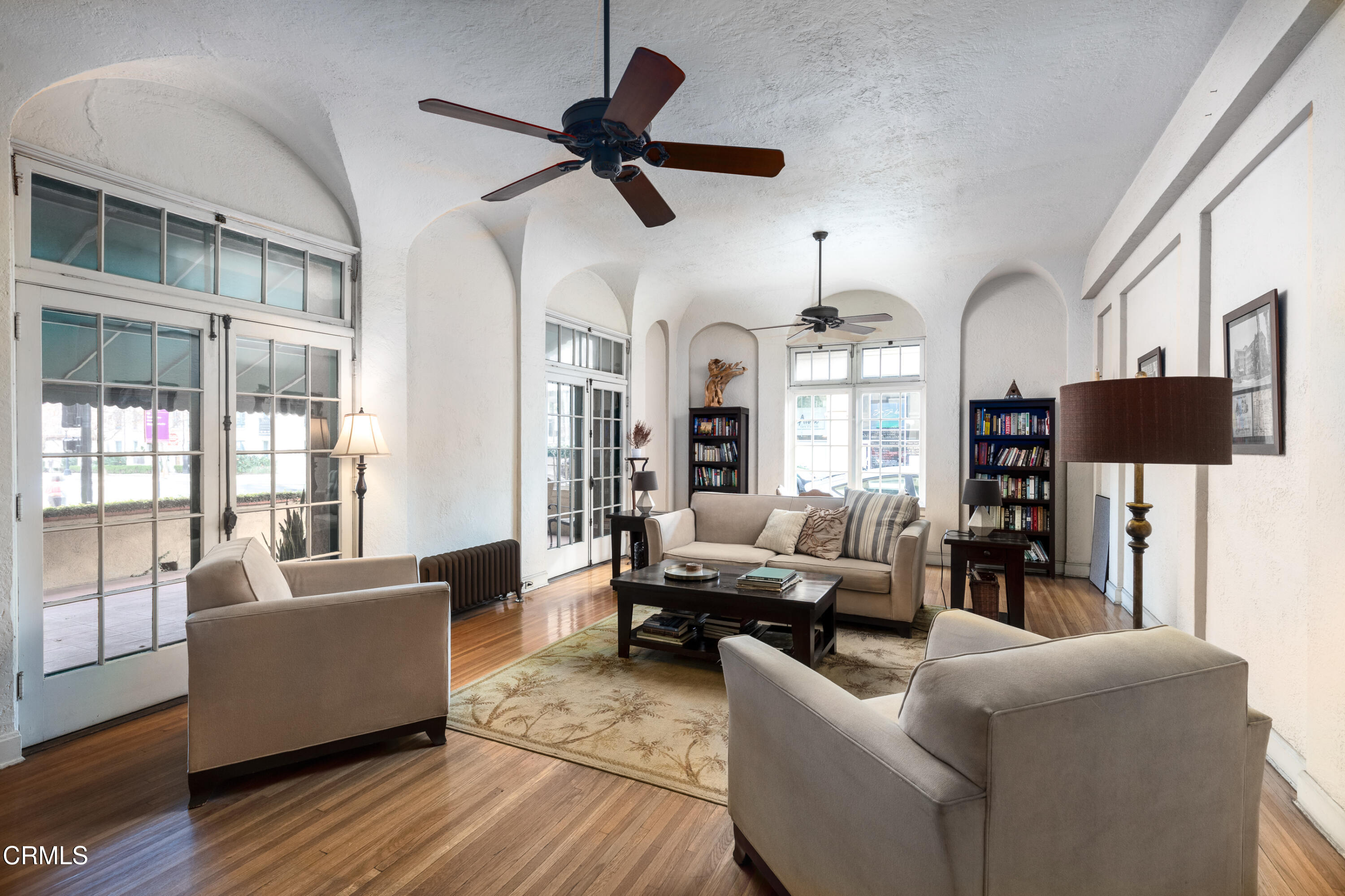 85 North Madison Avenue, Unit 48 Pasadena, CA 91101 - Photo 26 of 31 a living room with furniture wooden floor and a chandelier