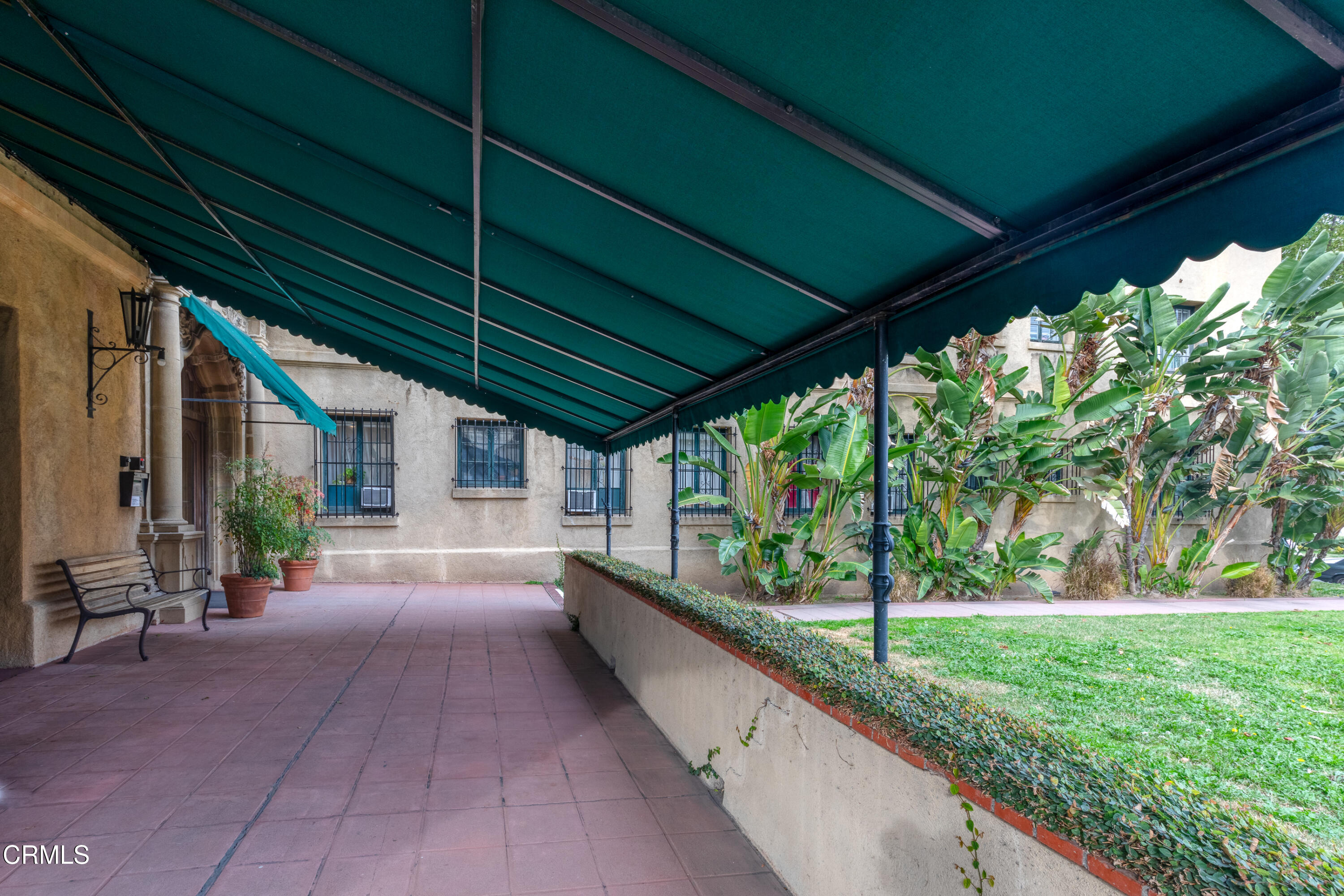 85 North Madison Avenue, Unit 48 Pasadena, CA 91101 - Photo 28 of 31 a view of a porch with furniture and garden