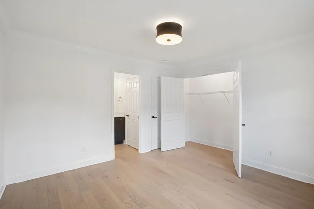 a view of a livingroom with wooden floor