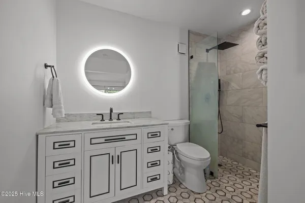 $455,000 | 650 Salter Path Road, Unit 303, Pine Knoll Shores, NC 28512