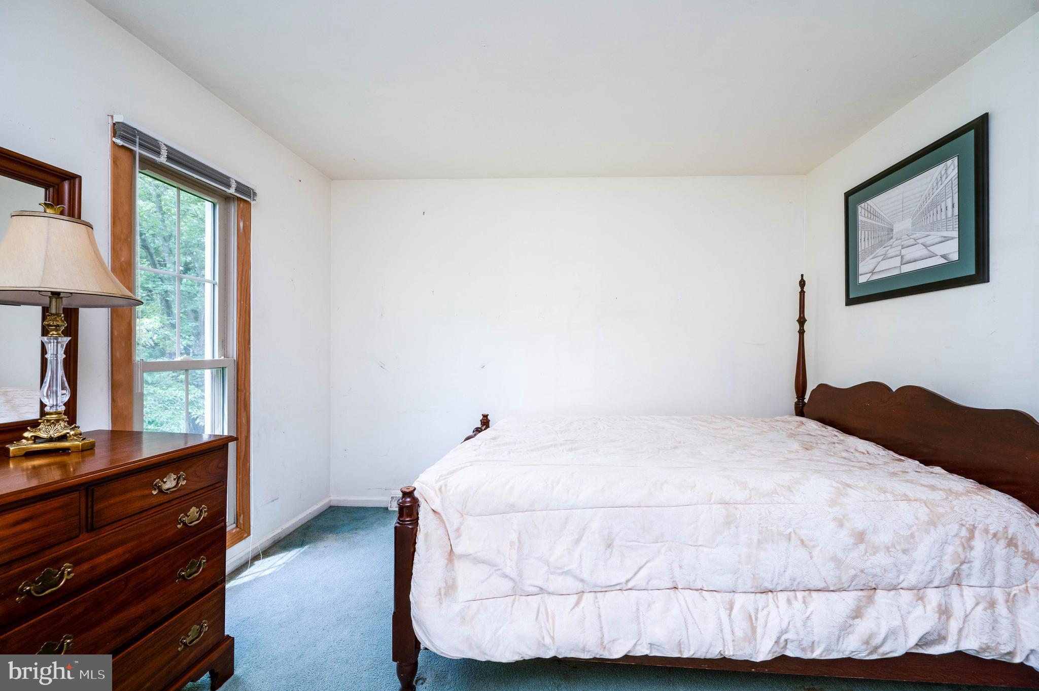 4 Nassau Circle Reading, PA 19607 - Photo 21 of 23 a bedroom with a bed and a window