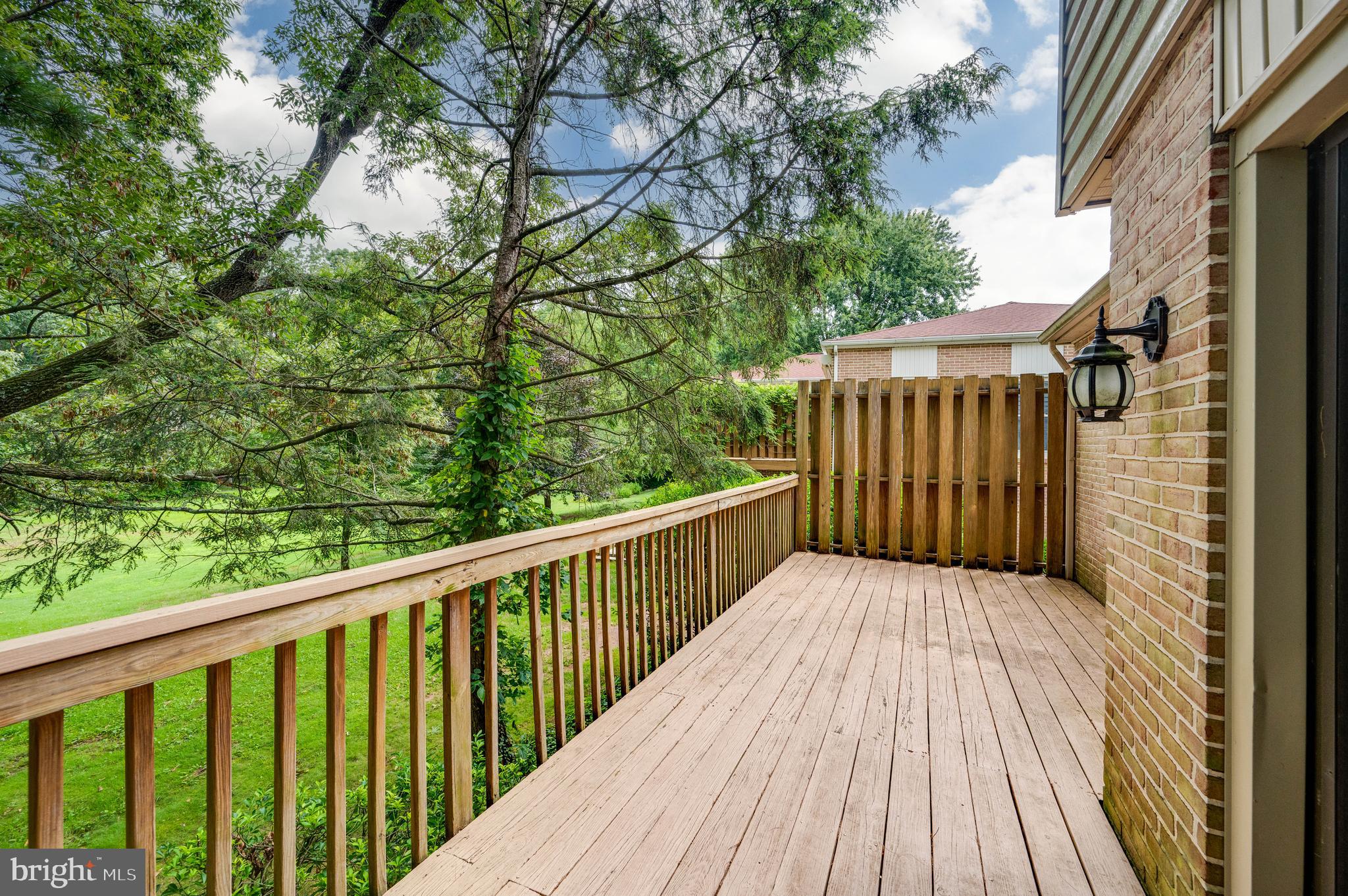4 Nassau Circle Reading, PA 19607 - Photo 22 of 23 a balcony with wooden floor and fence
