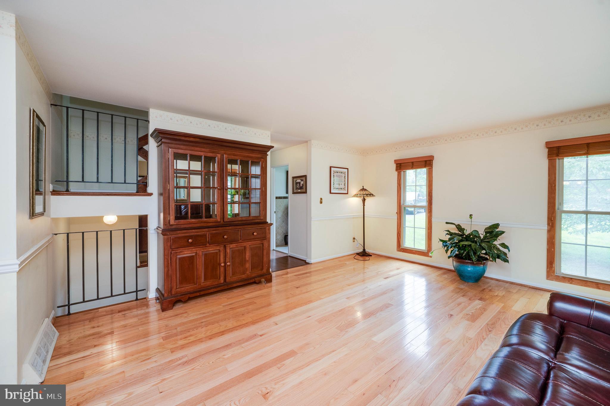 4 Nassau Circle Reading, PA 19607 - Photo 6 of 23 a view of an empty room with window and wooden floor