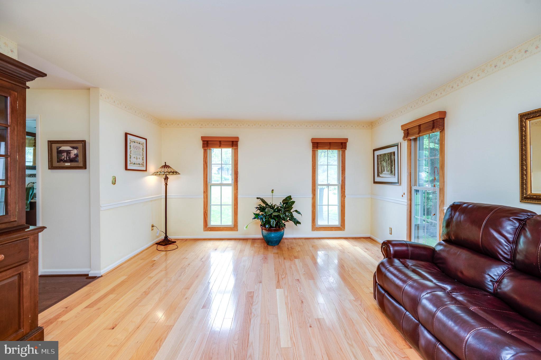 4 Nassau Circle Reading, PA 19607 - Photo 7 of 23 a living room with furniture and wooden floor