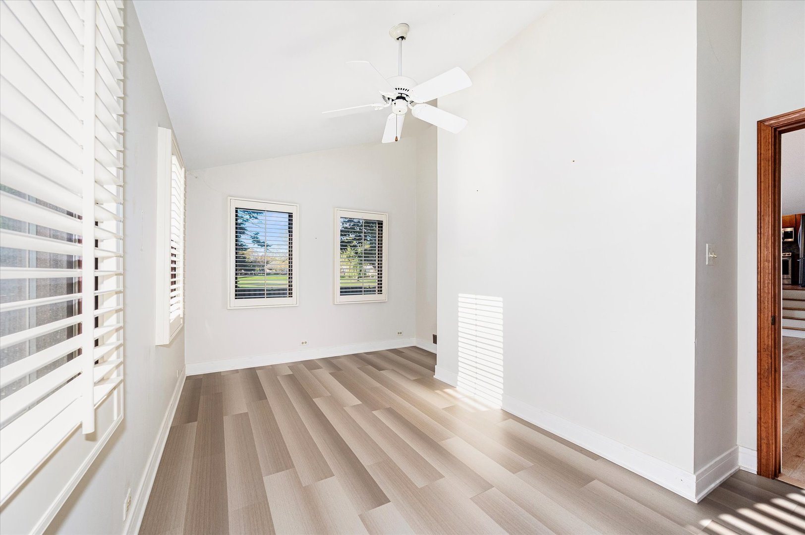 1228 Honey Hill Road Addison, IL 60101 - Photo 19 of 41 a view of an empty room with a window