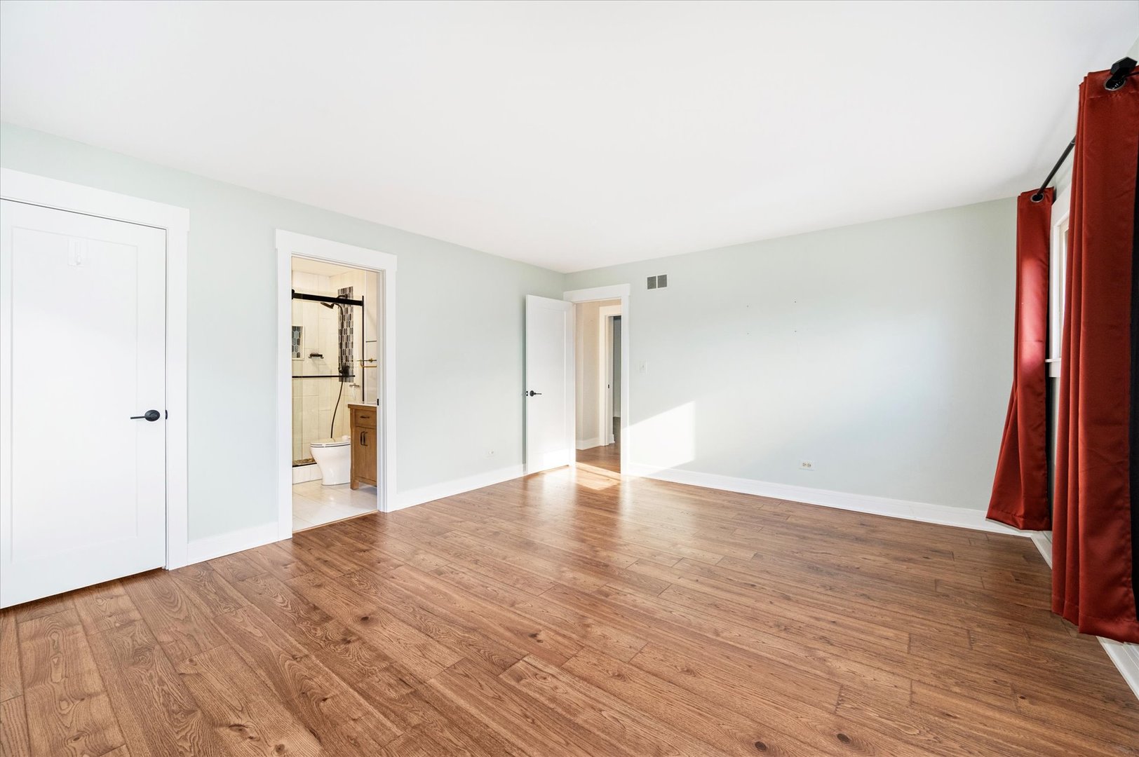 1228 Honey Hill Road Addison, IL 60101 - Photo 29 of 41 a view of an empty room with wooden floor and a window