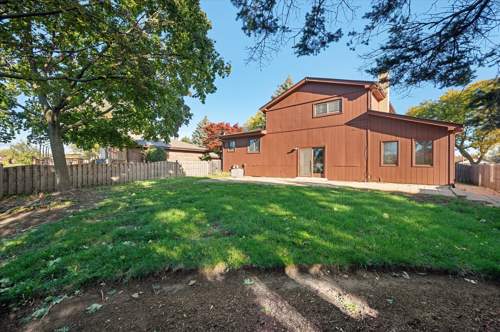 1228 Honey Hill Road Addison, IL 60101 - Photo 33 of 41 a front view of a house with a yard