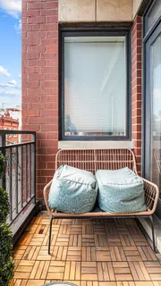 a view of a balcony with a window