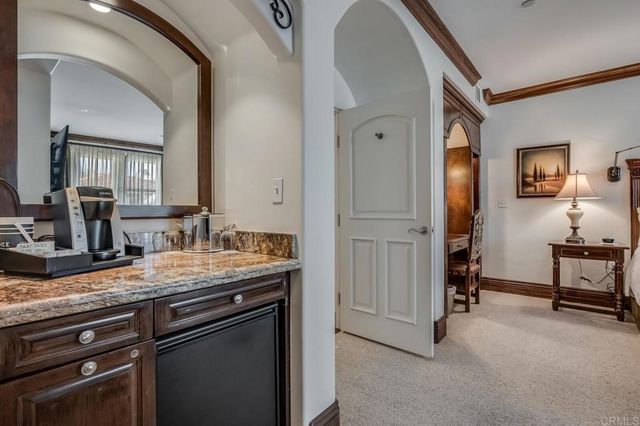 a view of a kitchen from a livingroom