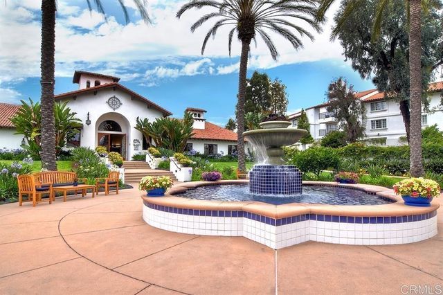 a front view of a house with swimming pool