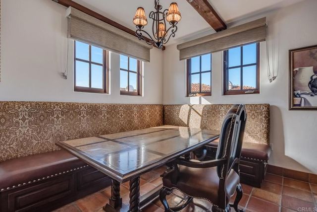 a view of a livingroom with furniture window and wooden floor