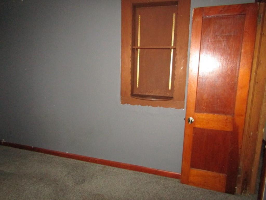247 Conson Road Pittsburgh, PA 15227 - Photo 18 of 27 an empty room with wooden floor and windows