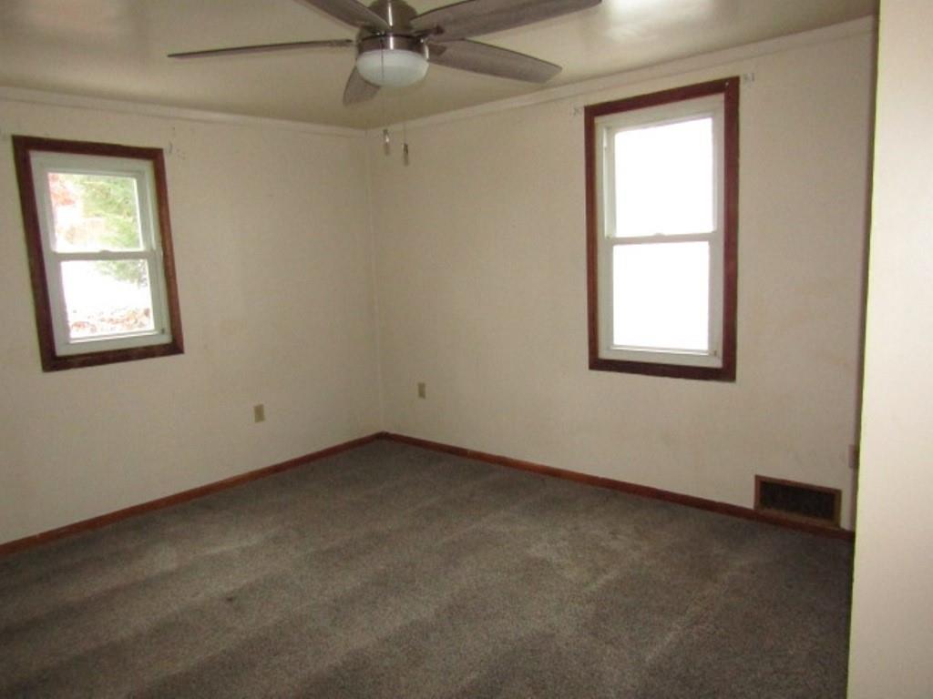 247 Conson Road Pittsburgh, PA 15227 - Photo 22 of 27 an empty room with a window