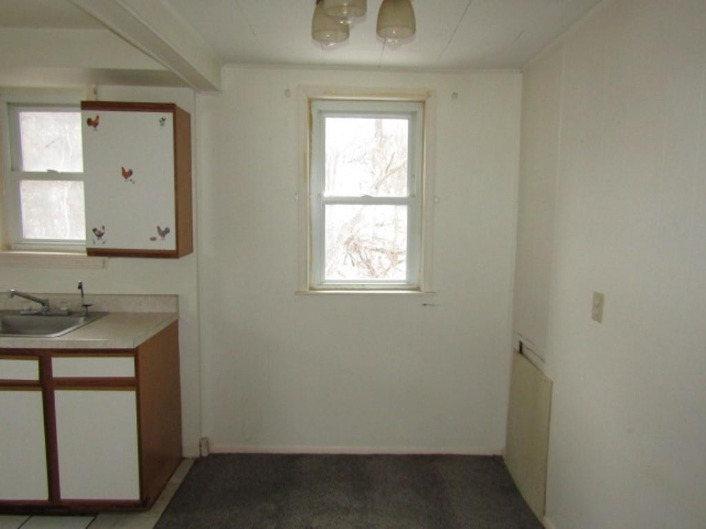 247 Conson Road Pittsburgh, PA 15227 - Photo 9 of 27 a bathroom with a sink and a window