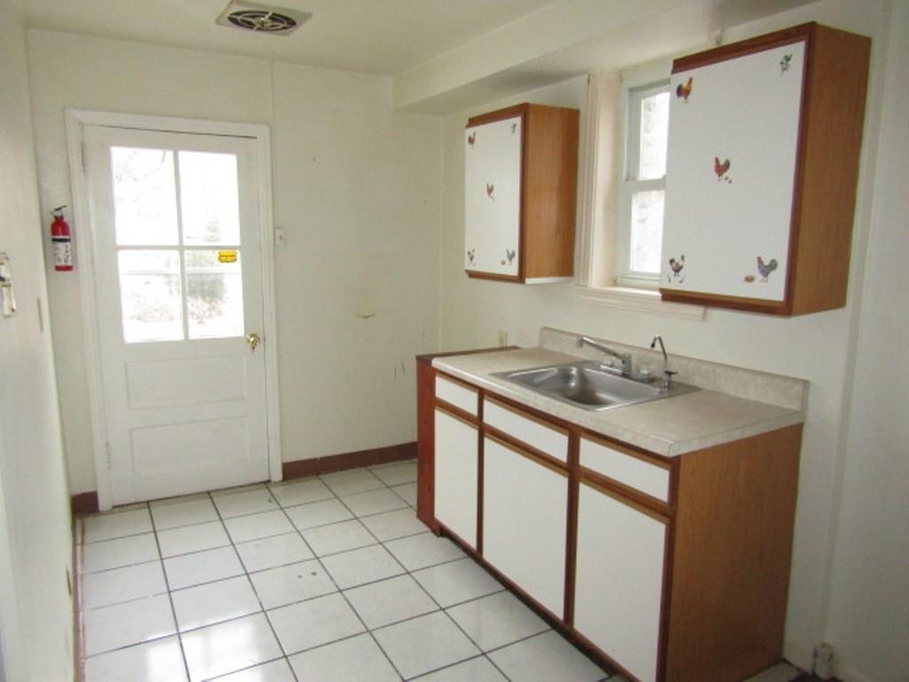 247 Conson Road Pittsburgh, PA 15227 - Photo 10 of 27 a bathroom with a sink a vanity and a mirror