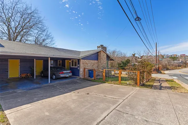 a view of a house with sitting area and roof