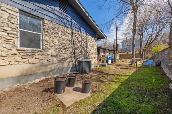 a view of a water fountain in the yard